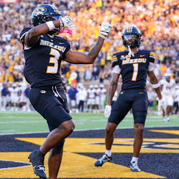 Aug 29, 2024; Columbia, Missouri, USA; Missouri Tigers wide receiver Luther Burden III (3) celebrates after scoring against the Murray State Racers during the first half at Faurot Field at Memorial Stadium. Mandatory Credit: Denny Medley-Imagn Images