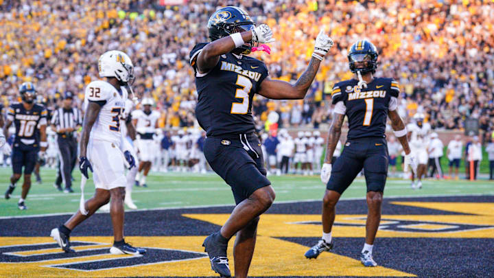 Aug 29, 2024; Columbia, Missouri, USA; Missouri Tigers wide receiver Luther Burden III (3) celebrates after scoring against the Murray State Racers during the first half at Faurot Field at Memorial Stadium. Mandatory Credit: Denny Medley-Imagn Images