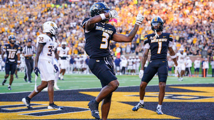 Aug 29, 2024; Columbia, Missouri, USA; Missouri Tigers wide receiver Luther Burden III (3) celebrates after scoring against the Murray State Racers during the first half at Faurot Field at Memorial Stadium. Mandatory Credit: Denny Medley-Imagn Images