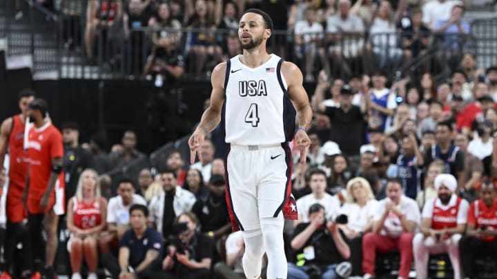 Jul 10, 2024; Las Vegas, Nevada, USA; USA guard Steph Curry (4) celebrates scoring on Canada during the first quarter of the USA Basketball Showcase at T-Mobile Arena. Mandatory Credit: Candice Ward-USA TODAY Sports