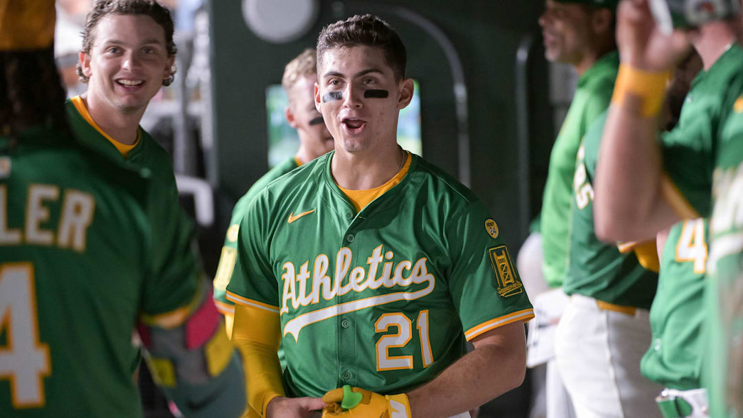 Aug 25, 2025; West Sacramento, California, USA; Athletics outfielder Tyler Soderstrom (21) celebrates with teammates after scoring against the Detroit Tigers in the seventh inning at Sutter Health Park. Mandatory Credit: Ed Szczepanski-Imagn Images