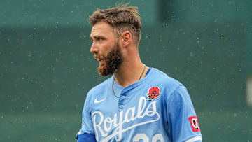 May 26, 2025; Kansas City, Missouri, USA; In his Major league debut, Kansas City Royals right fielder John Rave (26) returns to the dugout against the Cincinnati Reds in the seventh inning at Kauffman Stadium. Mandatory Credit: Denny Medley-Imagn Images