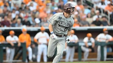 Jun 22, 2024; Omaha, NE, USA;  Texas A&M Aggies left fielder Caden Sorrell (13) drives in a run against the Tennessee Volunteers during the first inning at Charles Schwab Field Omaha. Mandatory Credit: Steven Branscombe-USA TODAY Sports