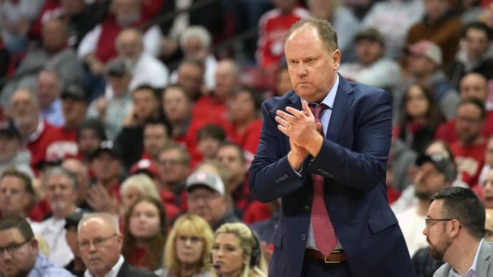 Feb 13, 2024; Madison, Wisconsin, USA;  Wisconsin Badgers head coach Greg Gard looks on during the first half against the Ohio State Buckeyes at the Kohl Center.