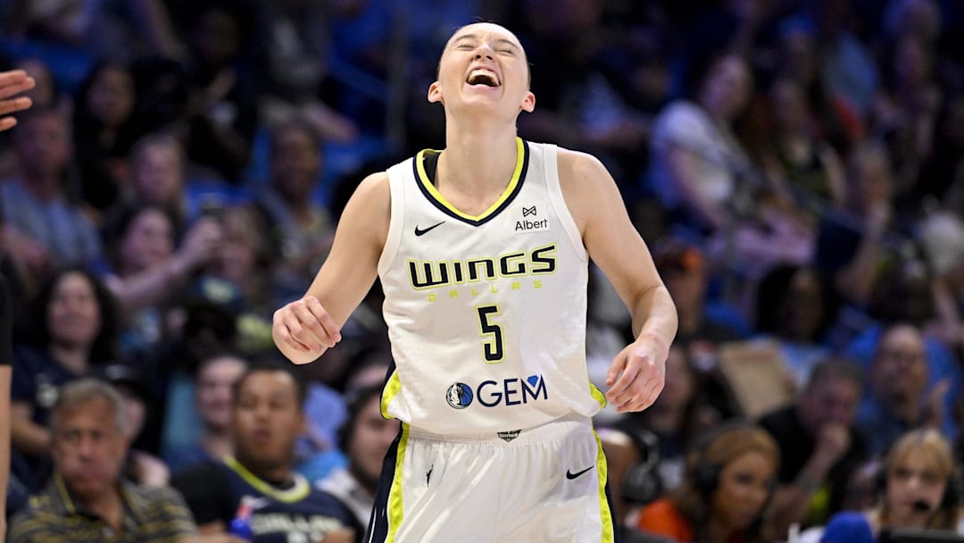 Jul 28, 2025; Arlington, Texas, USA; Dallas Wings guard Paige Bueckers (5) reacts to a call during the first half against the New York Liberty at College Park Center. Mandatory Credit: Jerome Miron-Imagn Images
