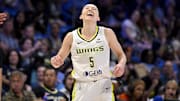 Jul 28, 2025; Arlington, Texas, USA; Dallas Wings guard Paige Bueckers (5) reacts to a call during the first half against the New York Liberty at College Park Center. Mandatory Credit: Jerome Miron-Imagn Images