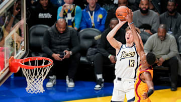 Team Detlef forward Matas Buzelis (13) of G League Ignite goes up for the game-winning shot over Team Pau forward Brandon Miller (24) of the Charlotte Hornets on Friday, Feb. 16, 2024, during the 2024 Panini Rising Stars Game at Gainbridge Fieldhouse in downtown Indianapolis.