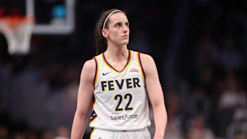 Indiana Fever guard Caitlin Clark (22) in action against the Atlanta Dream in the first half at State Farm Arena.