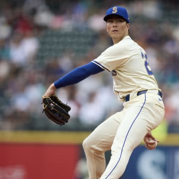 Seattle Mariners starting pitcher Bryan Woo (22) throws against the Houston Astros during the second inning at T-Mobile Park on July 21.