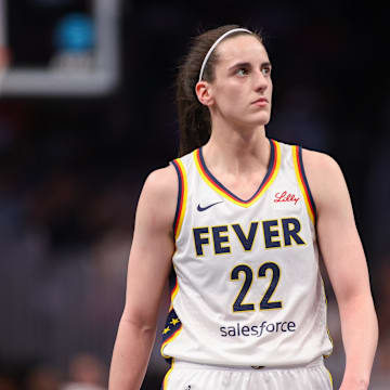Indiana Fever guard Caitlin Clark (22) in action against the Atlanta Dream in the first half at State Farm Arena.