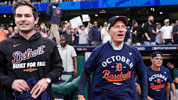 Detroit Tigers president of baseball operations Scott Harris, left, and owner Christopher Ilitch celebrate the 6-3 win over the Cleveland Guardians in Game 3 of the AL wild-card series at Progressive Field in Cleveland on Thursday, Oct. 2, 2025.