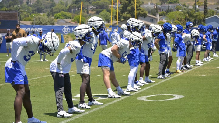 May 28, 2024; Thousand Oaks, CA, USA; Los Angeles Rams players stretch during OTAs at the team training facility at California Lutheran University. Mandatory Credit: Jayne Kamin-Oncea-USA TODAY Sports