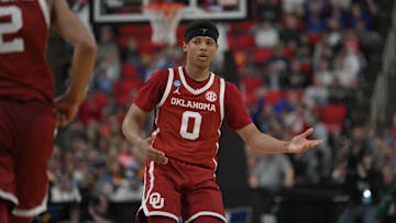 Mar 21, 2025; Raleigh, NC, USA;  Oklahoma Sooners guard Jeremiah Fears (0) reacts after scoring against UConn during the second half at Lenovo Center. Mandatory Credit: Zachary Taft-Imagn Images