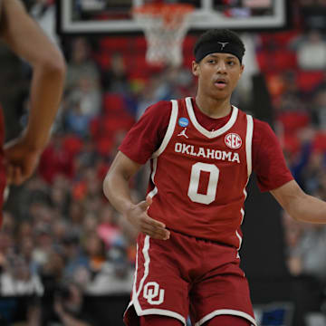 Mar 21, 2025; Raleigh, NC, USA;  Oklahoma Sooners guard Jeremiah Fears (0) reacts after scoring against UConn during the second half at Lenovo Center. Mandatory Credit: Zachary Taft-Imagn Images