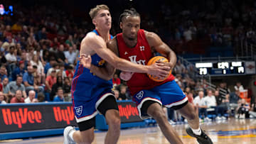 Kansas men's basketball's Darryn Peterson (22) drives to the basket during Late Night in the Phog, Friday, Oct. 17, 2025 at Allen Fieldhouse .