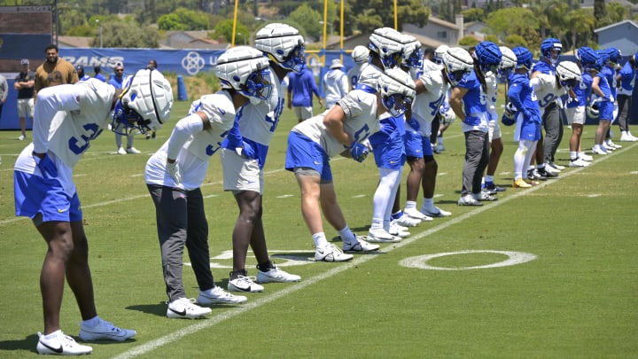 May 28, 2024; Thousand Oaks, CA, USA; Los Angeles Rams players stretch during OTAs at the team training facility at California Lutheran University. Mandatory Credit: Jayne Kamin-Oncea-USA TODAY Sports