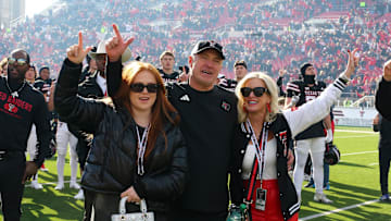 Nov 30, 2024; Lubbock, Texas, USA; Texas Tech Red Raiders head coach Joey McGuire celebrates with wife Debbie after a game against the West Virginia Mountaineers at Jones AT&T Stadium and Cody Campbell Field. Mandatory Credit: Michael C. Johnson-Imagn Images