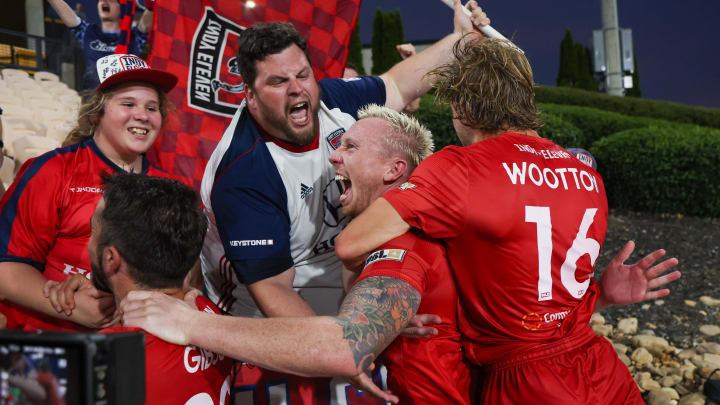 Jul 9, 2024; Kennesaw, Georgia, USA; Indy Eleven defender Callum Chapman-Page (5) celebrates with midfielder Laurence Wootton (16) after a victory over Atlanta United in the second half at Fifth Third Bank Stadium. Mandatory Credit: Brett Davis-USA TODAY Sports