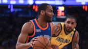 May 14, 2024; New York, New York, USA; New York Knicks guard Alec Burks (18) dribbles against Indiana Pacers forward Obi Toppin (1) during the second half during game five of the second round for the 2024 NBA playoffs at Madison Square Garden. Mandatory Credit: Vincent Carchietta-USA TODAY Sports