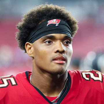 Aug 9, 2025; Tampa, Florida, USA; Tampa Bay Buccaneers cornerback Jacob Parrish (25) looks on after a preseason game against the Tennessee Titans at Raymond James Stadium. Mandatory Credit: Nathan Ray Seebeck-Imagn Images