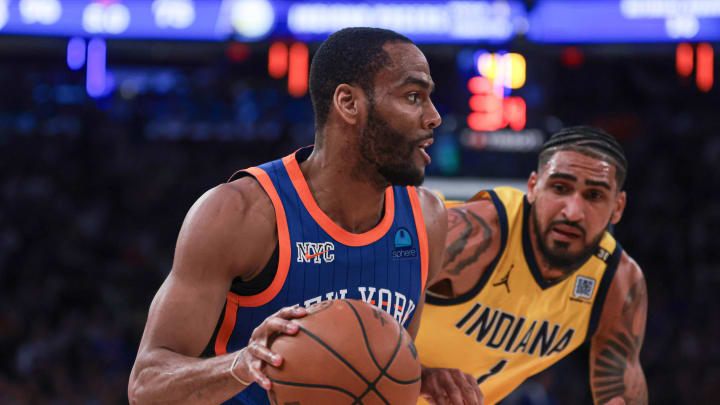 May 14, 2024; New York, New York, USA; New York Knicks guard Alec Burks (18) dribbles against Indiana Pacers forward Obi Toppin (1) during the second half during game five of the second round for the 2024 NBA playoffs at Madison Square Garden. Mandatory Credit: Vincent Carchietta-USA TODAY Sports