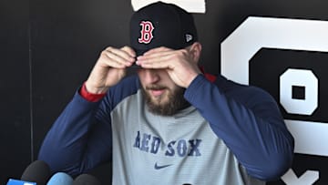 Boston Red Sox pitcher Garrett Crochet (35) talks with the media before the teamís game against the Chicago White Sox at Guaranteed Rate Field.