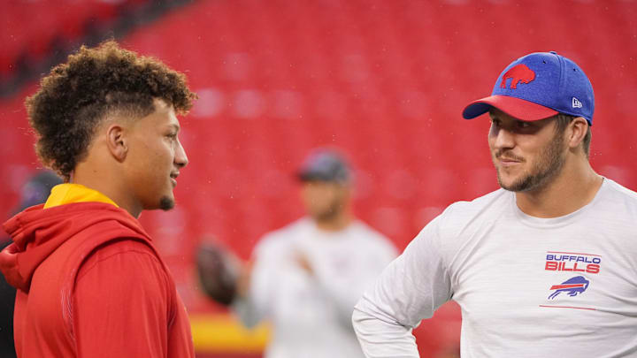 Oct 10, 2021; Kansas City, Missouri, USA; Kansas City Chiefs quarterback Patrick Mahomes (15) talks with Buffalo Bills quarterback Josh Allen (17) before warm ups at GEHA Field at Arrowhead Stadium. Mandatory Credit: Denny Medley-Imagn Images
