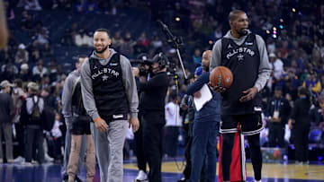 Feb 15, 2025; Oakland, CA, USA; Shaq’s OGs guard Stephen Curry (30) of the Golden State Warriors stands next to forward Kevin Durant (35) of the Phoenix Suns during the NBA All Star-Practice at Oracle Arena. Mandatory Credit: Cary Edmondson-Imagn Images