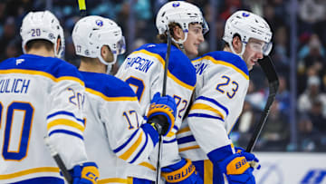 Jan 20, 2025; Seattle, Washington, USA; Buffalo Sabres center Tage Thompson (72) celebrates with defenseman Mattias Samuelsson (23) after scoring a goal against the Seattle Kraken during the second period at Climate Pledge Arena. Mandatory Credit: Joe Nicholson-Imagn Images