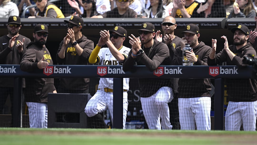 San Diego Padres starting pitcher Joe Musgrove (44) looks on alongside starting pitchers Michael King (34) and Dylan Cease (84) during the first inning against the San Francisco Giants at Petco Park on March 28, 2024.