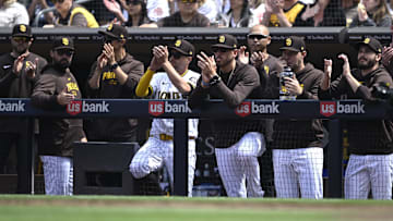 San Diego Padres starting pitcher Joe Musgrove (44) looks on alongside starting pitchers Michael King (34) and Dylan Cease (84) during the first inning against the San Francisco Giants at Petco Park on March 28, 2024.