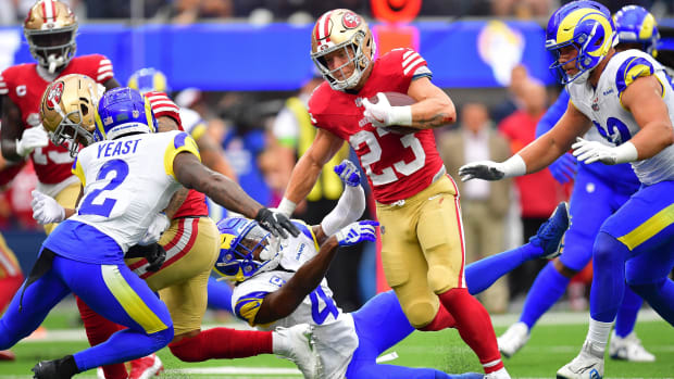 San Francisco 49ers running back Christian McCaffrey (23) runs for a touchdown against the Los Angeles Rams 