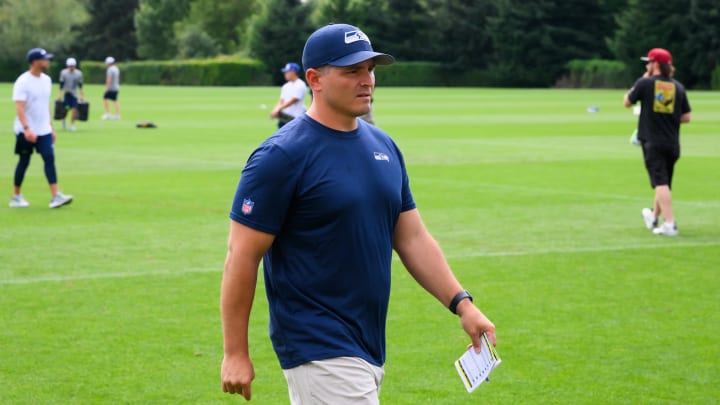 Seattle Seahawks head coach Michael Macdonald walks off the field after training camp at Virginia Mason Athletic Center.