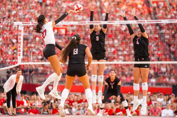 Nebraska Cornhuskers outside hitter Harper Murray (27) attacks the ball against the Omaha Mavericks during the first set at M