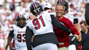 Oct 19, 2024; Norman, Oklahoma, USA;  South Carolina Gamecocks defensive tackle Tonka Hemingway (91) celebrates with South Carolina Gamecocks head coach Shane Beamer after returning a fumble for a touchdown during the first half against the Oklahoma Sooners at Gaylord Family-Oklahoma Memorial Stadium. Mandatory Credit: Kevin Jairaj-Imagn Images