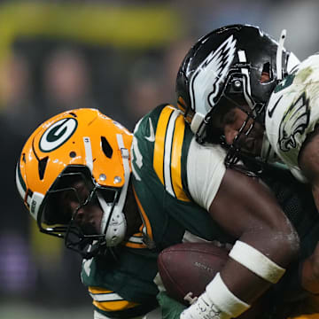 Sep 6, 2024; Sao Paulo, BRA; Philadelphia Eagles linebacker Zack Baun (53) tackles Green Bay Packers running back Emanuel Wilson (31) during the second half at Neo Quimica Arena. Mandatory Credit: Kirby Lee-Imagn Images