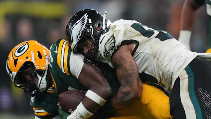 Sep 6, 2024; Sao Paulo, BRA; Philadelphia Eagles linebacker Zack Baun (53) tackles Green Bay Packers running back Emanuel Wilson (31) during the second half at Neo Quimica Arena. Mandatory Credit: Kirby Lee-Imagn Images