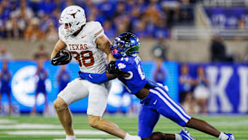 Texas Longhorns tight end Jack Endries (88) is tackled by Kentucky Wildcats defensive back Ty Bryant (14) during the second quarter at Kroger Field. 