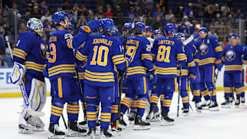 Sep 21, 2024; Buffalo, New York, USA;  The Buffalo Sabres celebrate a win over the Pittsburgh Penguins at KeyBank Center. Mandatory Credit: Timothy T. Ludwig-Imagn Images