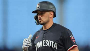 Jul 3, 2025; Miami, Florida, USA; Minnesota Twins right fielder Trevor Larnach (9) reacts from first base after hitting a single against the Miami Marlins during the eighth inning at loanDepot Park. Mandatory Credit: Sam Navarro-Imagn Images