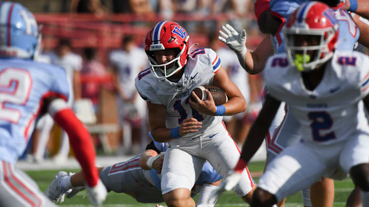 Vestavia Hills' William Tonsmeire Jr. (1) scores a touchdown on a run at Hillcrest High School Friday Sept. 13, 2024.
