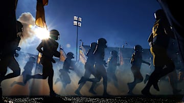 The West Virginia Mountaineers takes the field prior to an NCAA college football game against the Cincinnati Bearcats, Saturday, Nov. 18, 2023, at Milan Puskar Stadium in Morgantown, W. Va.