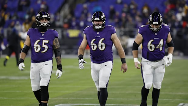 Baltimore Ravens offensive linemen Patrick Mekari, Ben Cleveland and Tyler Linderbaum