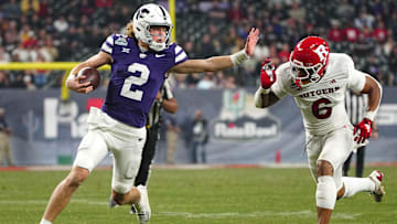 Kansas State quarterback Avery Johnson (2) scrambles against Rutgers during second half of the Rate Bowl at Chase Field on Dec. 26, 2024, in Phoenix.
