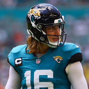 Sep 8, 2024; Miami Gardens, Florida, USA; Jacksonville Jaguars quarterback Trevor Lawrence (16) looks on against the Miami Dolphins during the first quarter at Hard Rock Stadium. Mandatory Credit: Sam Navarro-Imagn Images