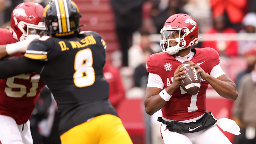 Arkansas quarterback KJ Jackson (7) drops back to pass in the first quarter against Missouri at Razorback Stadium. 