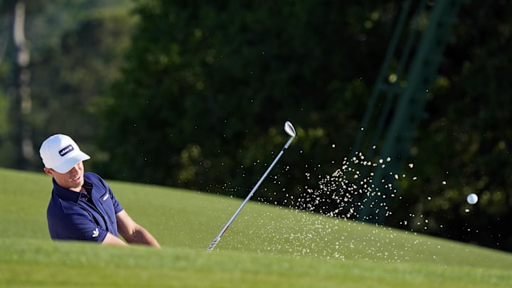 Ludvig Aberg plays from the bunker on the 18th green during the final round of the Masters Tournament. Ludvig Aberg plays from the bunker on the 18th green during the final round of the Masters Tournament.