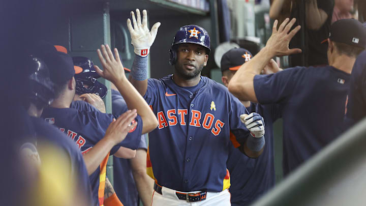 Sep 1, 2024; Houston, Texas, USA; Houston Astros left fielder Yordan Alvarez (44) celebrates in the dugout after hitting a home run during the fourth inning against the Kansas City Royals at Minute Maid Park.