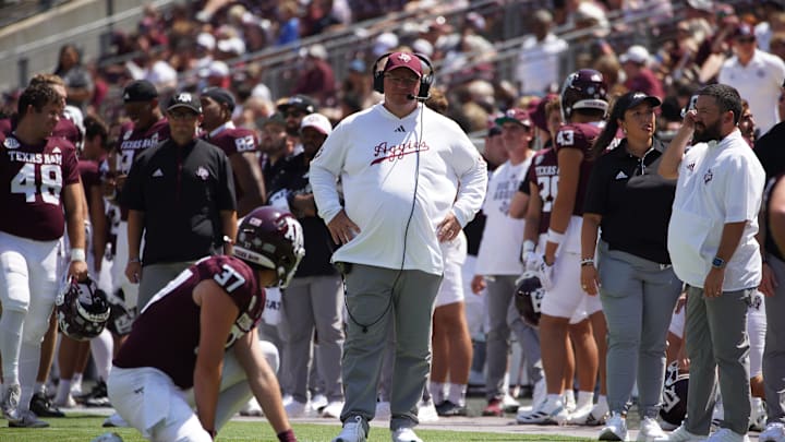 Sep 7, 2024; College Station, Texas, USA; Texas A&M Aggies head coach Mike Elko works the sideline during the fourth quarter against the McNeese State Cowboys at Kyle Field. Mandatory Credit: Dustin Safranek-Imagn Images