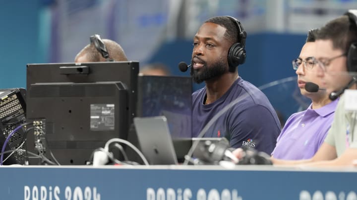 Jul 27, 2024; Villeneuve-d'Ascq, France; Dwyane Wade looks on from the media bench during the first half between Canada and Greece during the Paris 2024 Olympic Summer Games at Stade Pierre-Mauroy. Mandatory Credit: John David Mercer-USA TODAY Sports